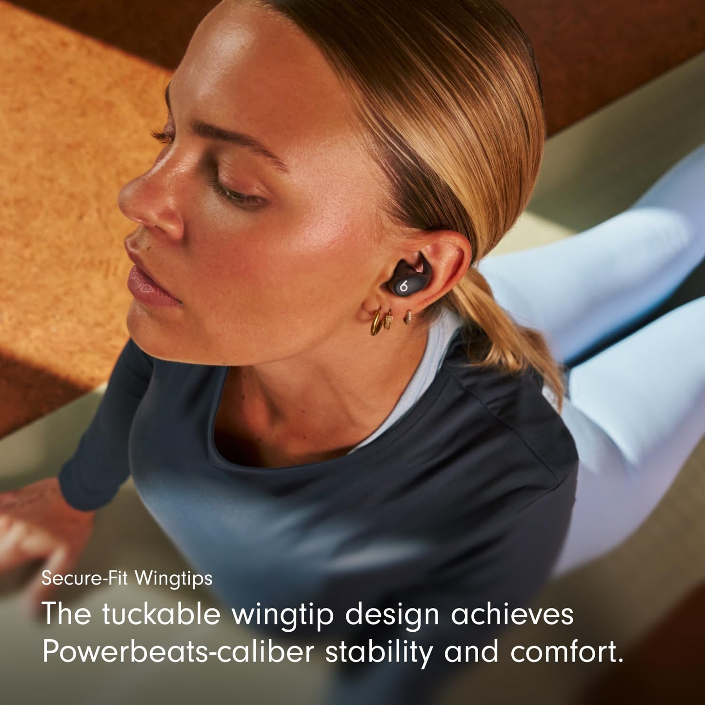 Beats - Powerbeats Fit - Wireless Noise-Cancelling Workout Earbuds with Ultimate Secure Fit, IPX4, Up to 30H of Battery Life & Charging case, Compatible with Apple & Android - Spark Orange